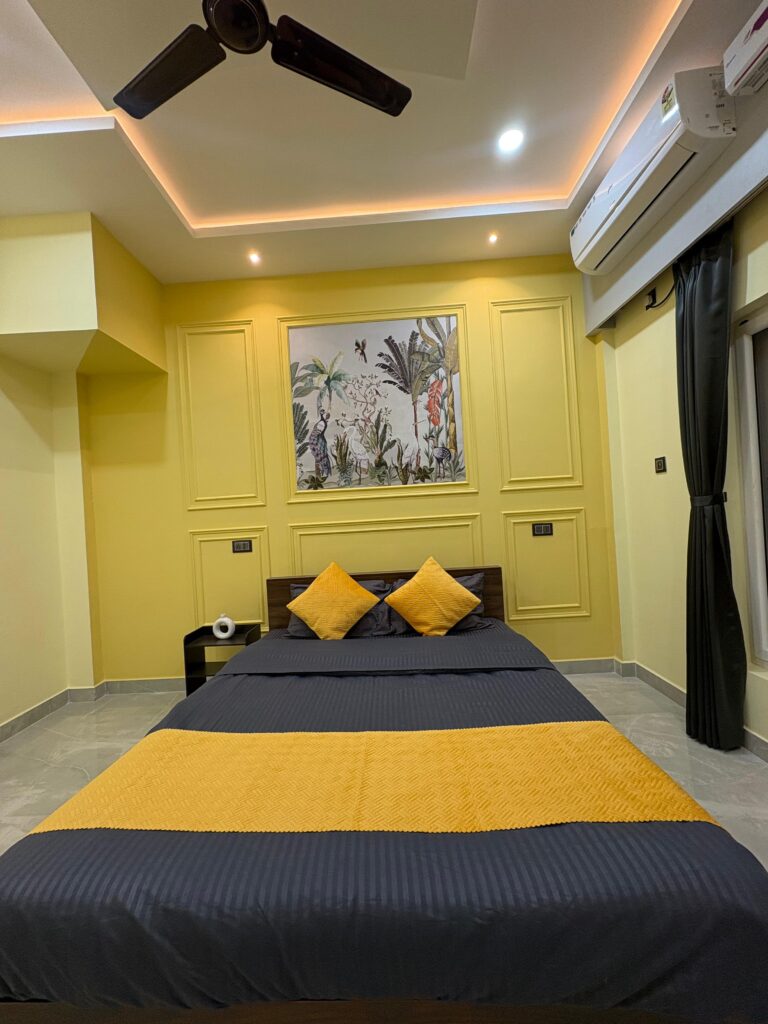yellow bedroom with bed copy